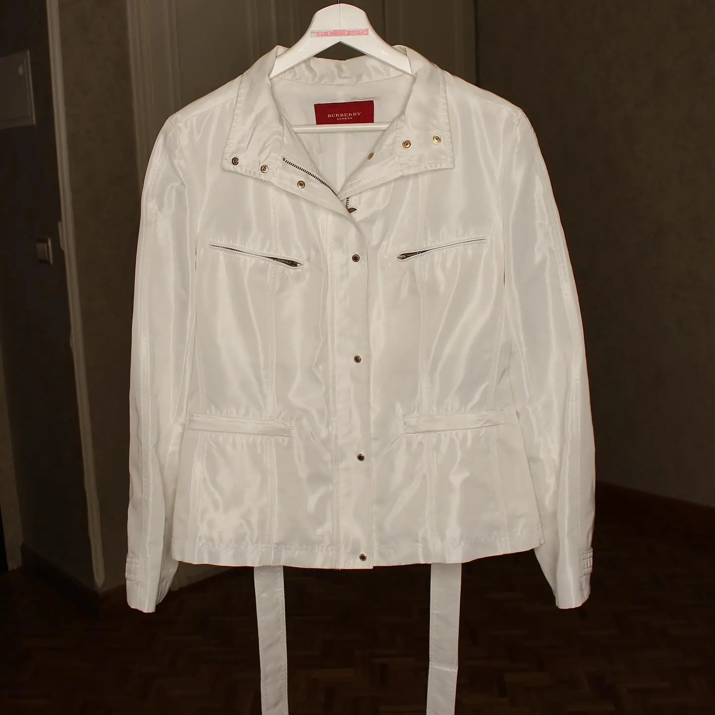 White Burberry women’s zippered down jacket, belted waist, view 2 of 11
