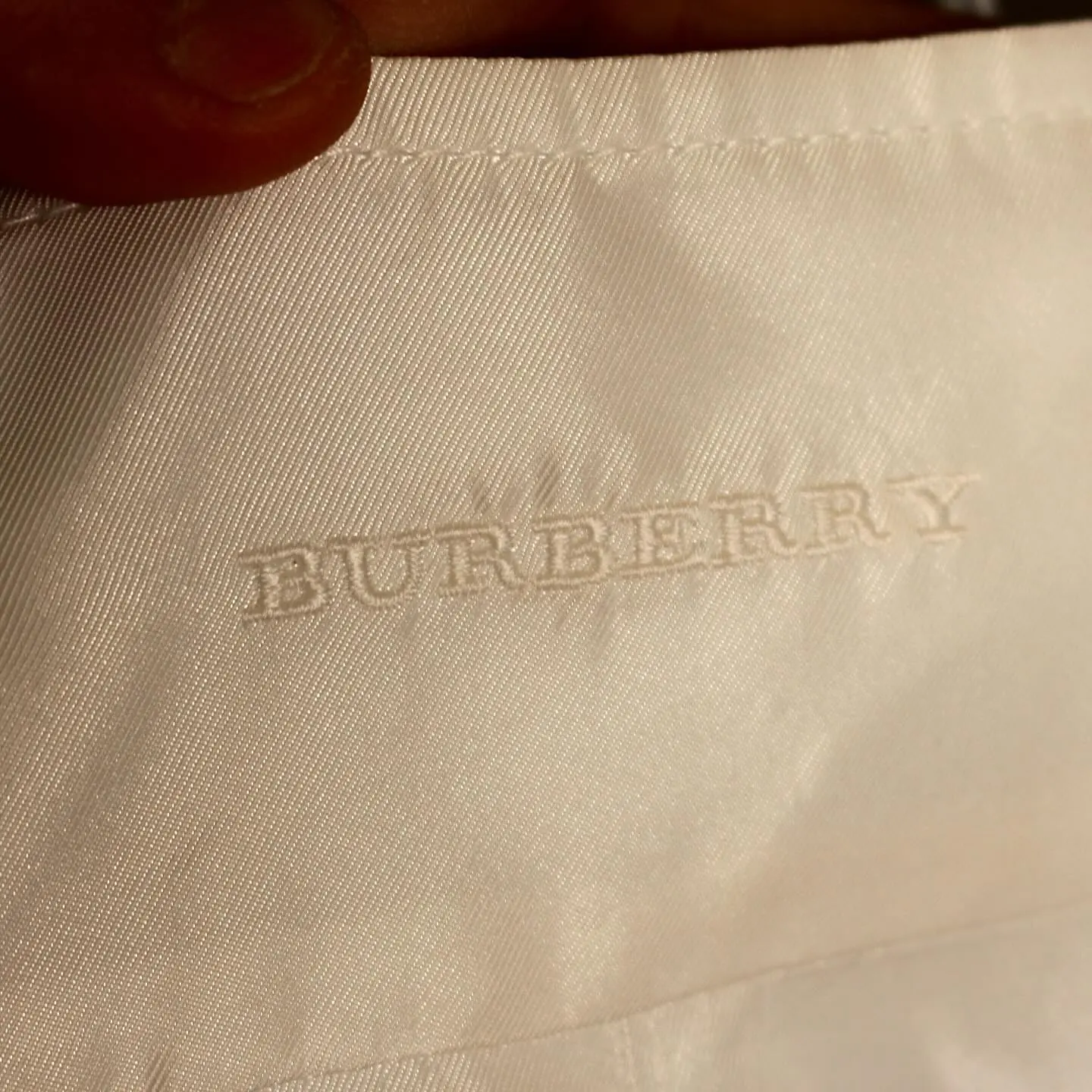 White Burberry women’s zippered down jacket, belted waist, view 9 of 11