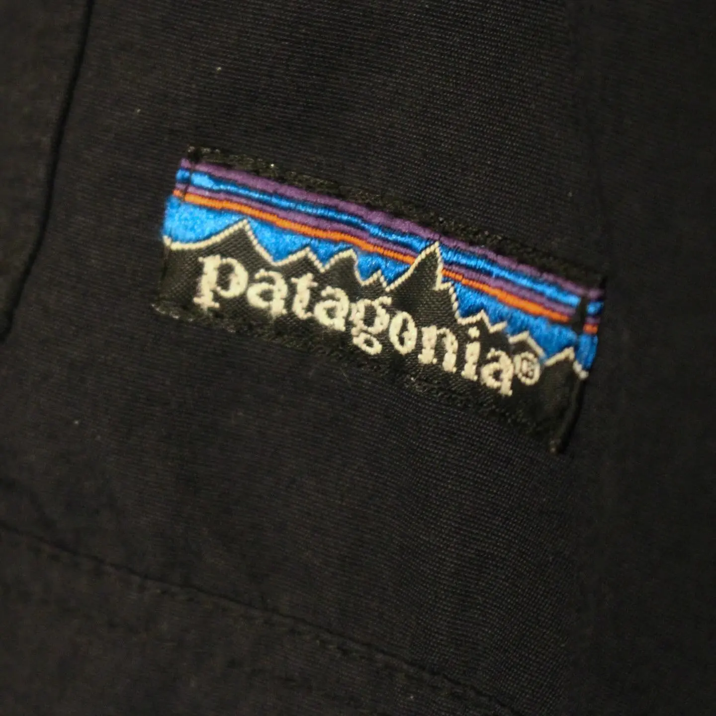 Vintage Y2K Patagonia Hooded Lightweight Half Zip Pullover Rain Jacket in Black and Teal, view 1 of 4